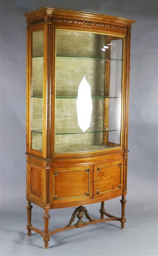 An Edwardian satinwood bowfront display cabinet, W.3ft 6in. D.1ft 8in. H.7ft 3in.
